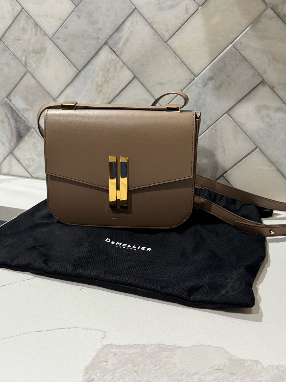 DeMellier taupe leather crossbody with gold hardware